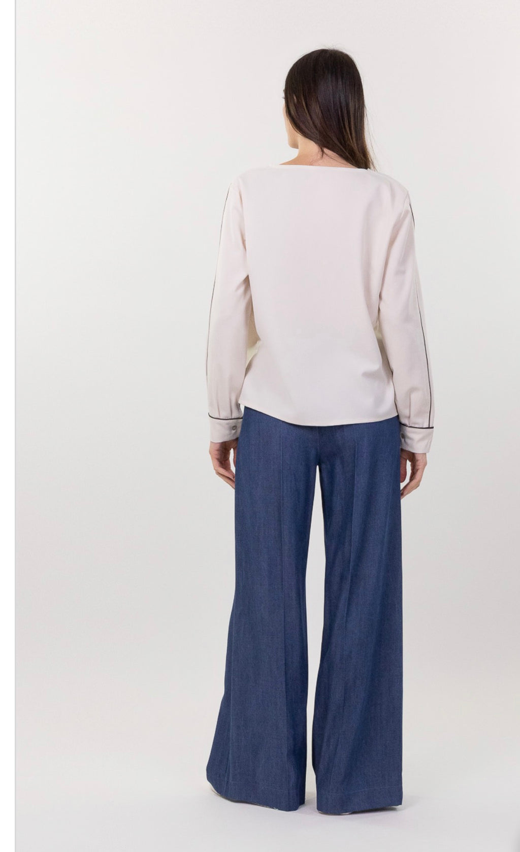 Blusa con profilo a contrasto