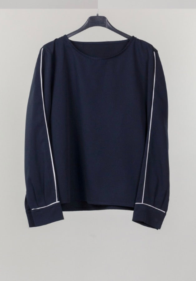 Blusa con profilo a contrasto
